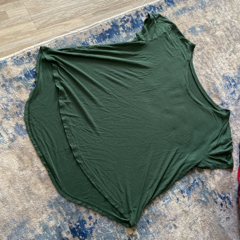 I’m selling a green shirt,  it’s a medium in women
